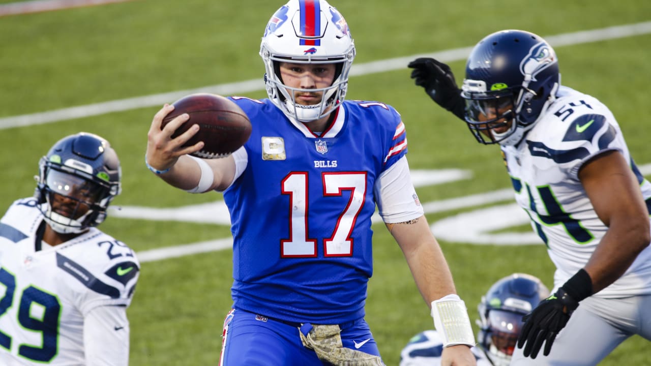 Buffalo Bills quarterback Josh Allen races to the edge for a touchdown