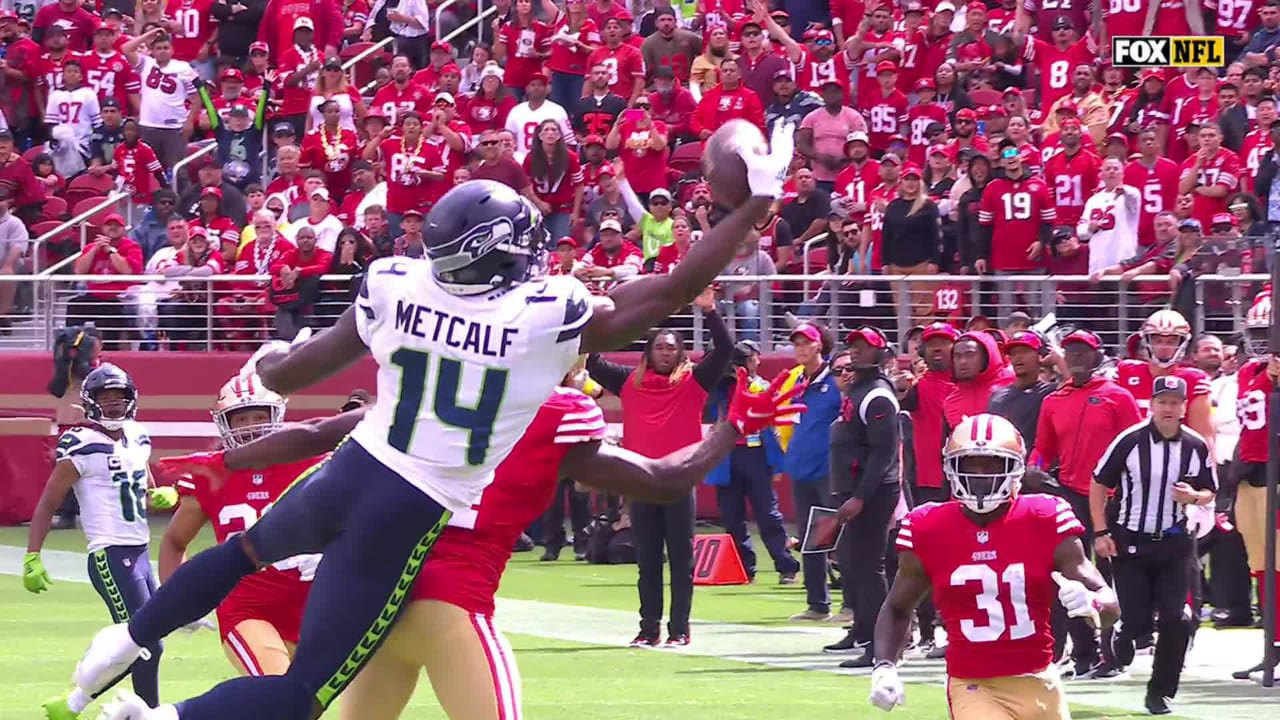 DK Metcalf of the Seattle Seahawks attempts to catch a pass