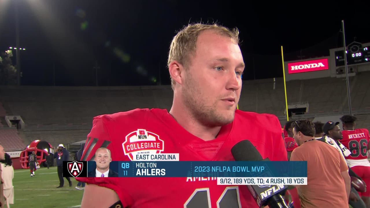 East Carolina University quarterback Holton Ahlers reacts to winning