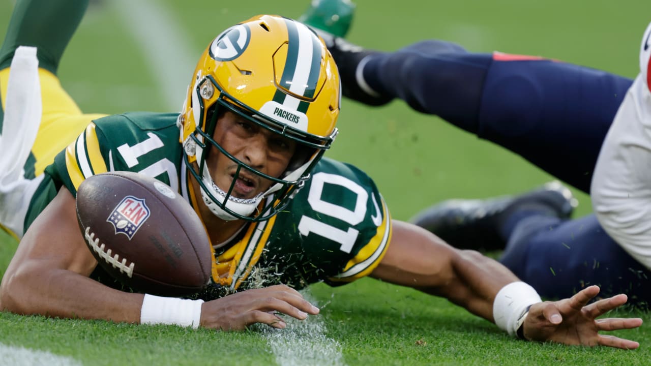 Detroit Lions cornerback Ifeatu Melifonwu lays the boom on a sideline hit  vs. Green Bay Packers running back Aaron Jones