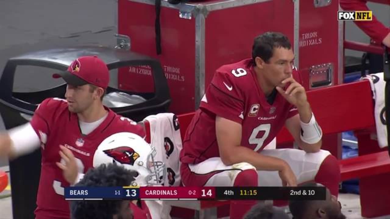 Josh Rosen warms up on the sidelines