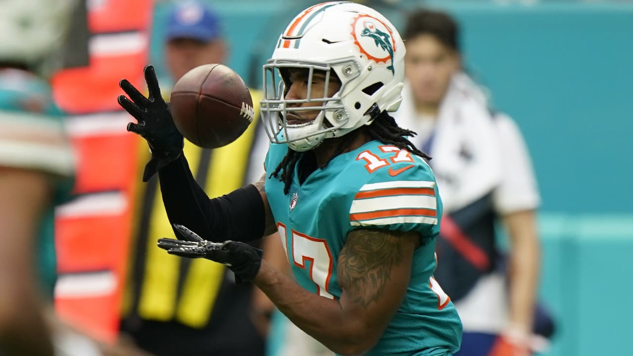 Miami Dolphins wide receiver Jaylen Waddle (17) kneels on the field before  the start of an NFL football game against the Atlanta Falcons, Sunday Oct  24, 2021, in Miami Gardens, Fla. (AP