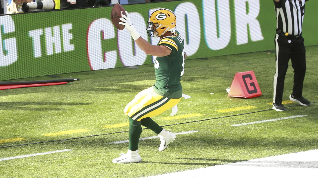 Allen Lazard of the Green Bay Packers jogs off the field after the