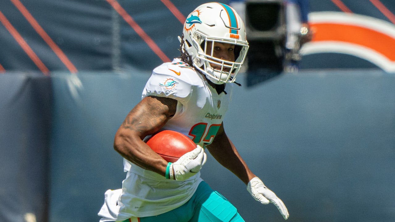Miami Dolphins wide receiver Jaylen Waddle weaves his way to 26yard
