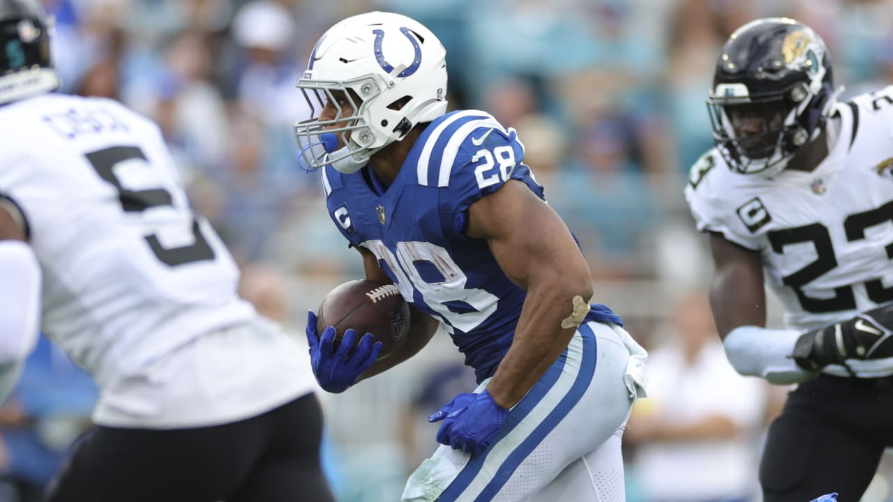 November 28, 2021: Indianapolis Colts running back Jonathan Taylor (28) in throwback  uniform during NFL football game action between the Tampa Bay Buccaneers  and the Indianapolis Colts at Lucas Oil Stadium in