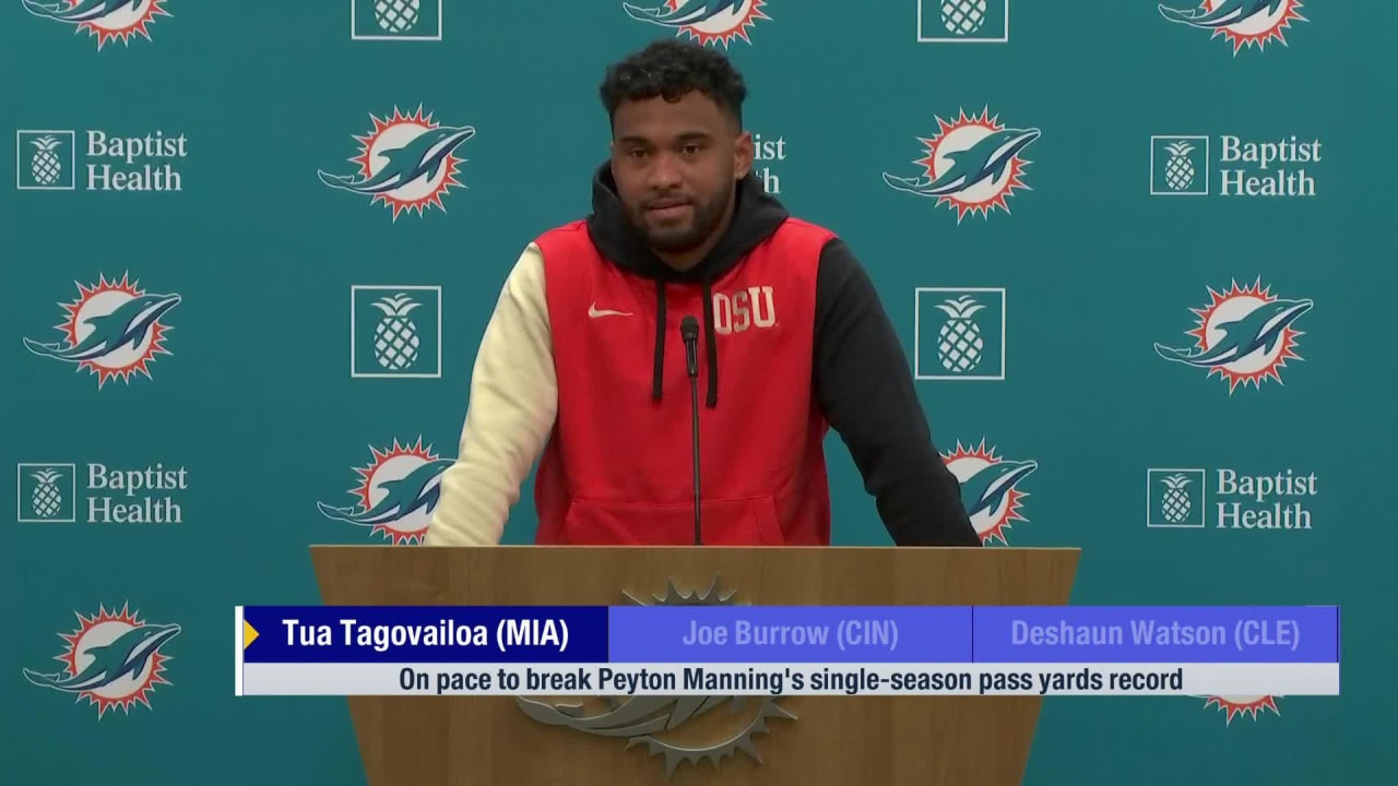Miami Dolphins quarterback Tua Tagovailoa reacts to being on pace to