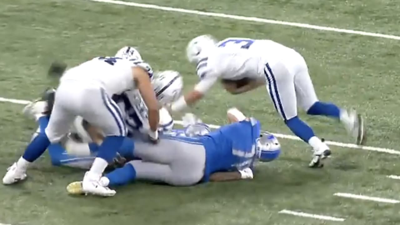 Detroit Lions' defense bring Indianapolis Colts quarterback Jack Coan down  for huge third-down sack