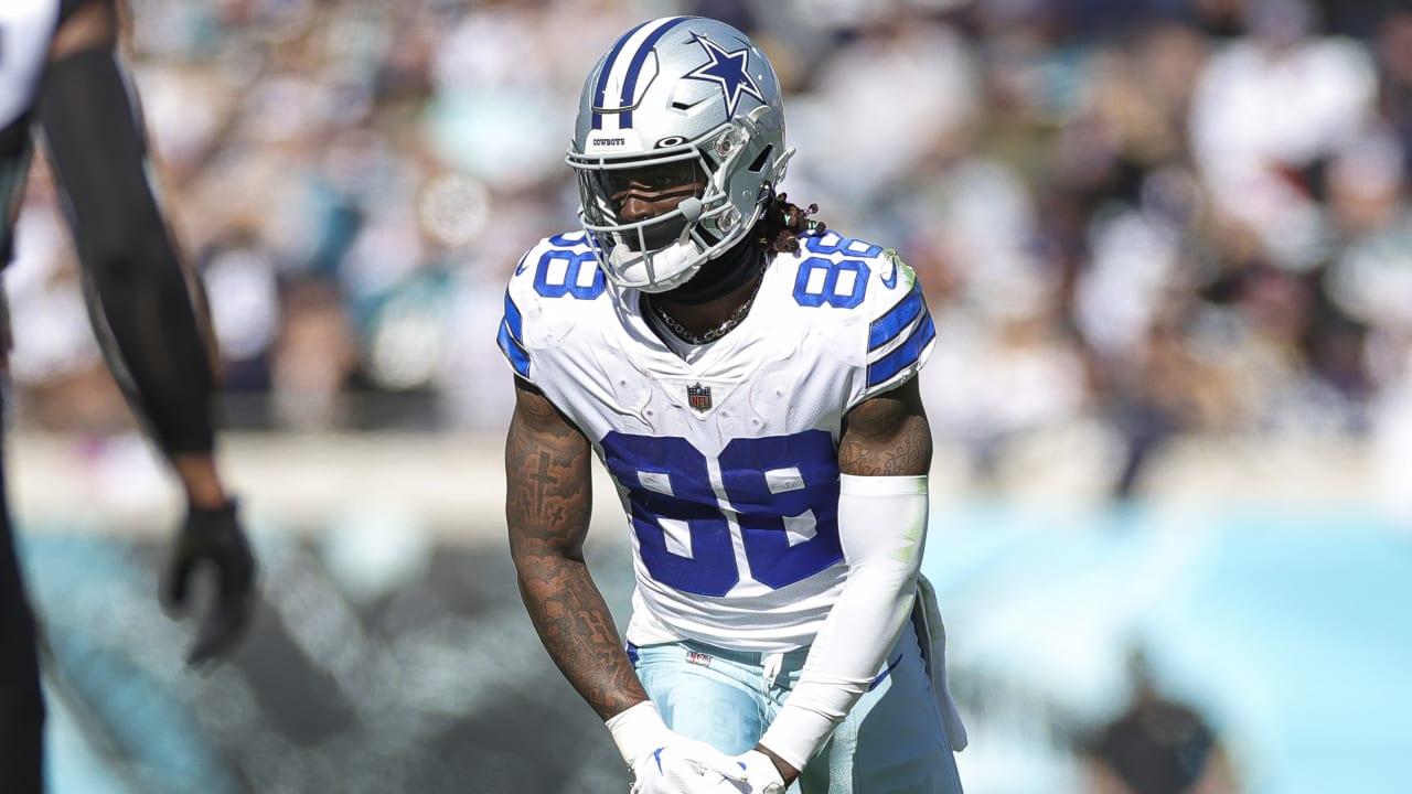 Dallas Cowboys wide receiver CeeDee Lamb boxes out Jacksonville Jaguars