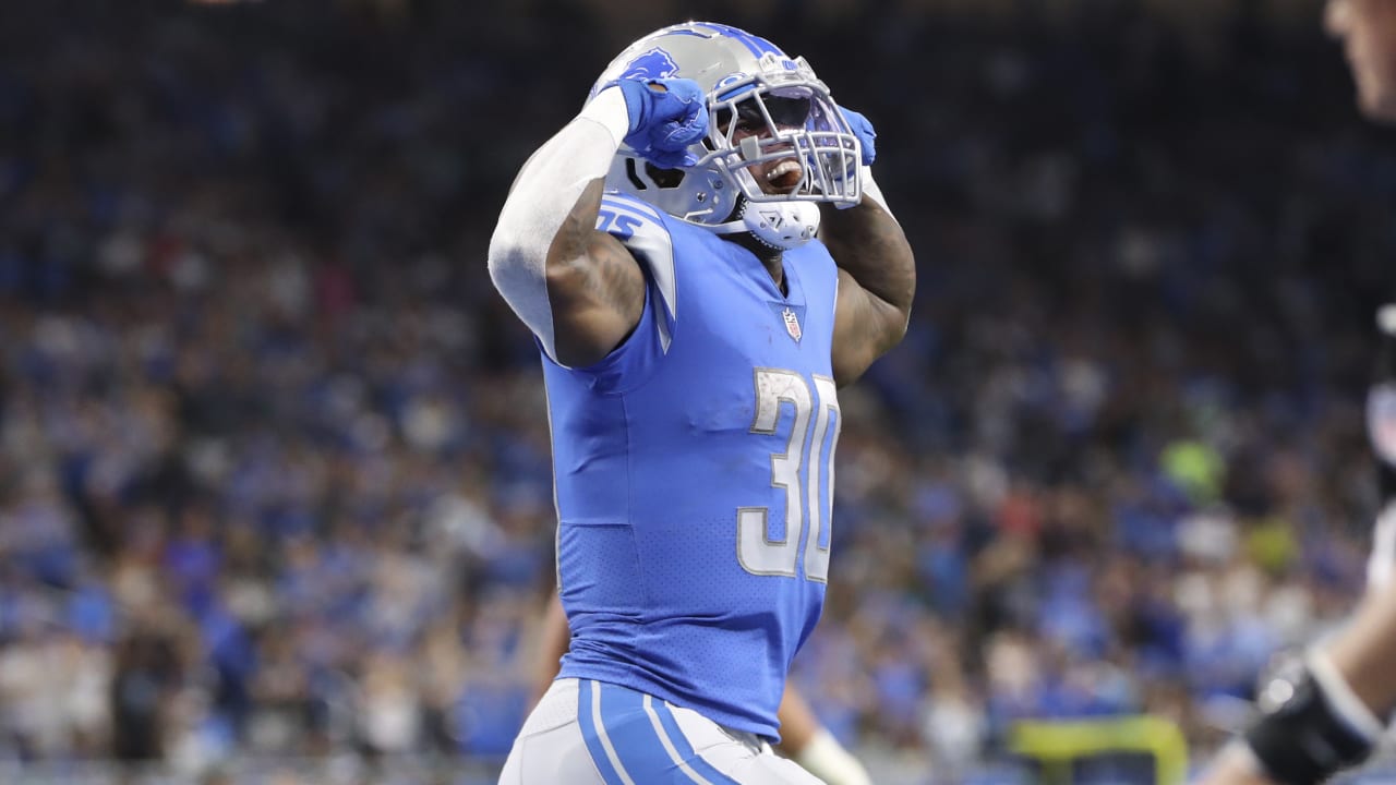 DETROIT, MI - SEPTEMBER 26: Detroit Lions running back Jamaal Williams (30)  celebrates after a fourth quarter touchdown during NFL game between  Baltimore Ravens and Detroit Lions on September 26, 2021 at