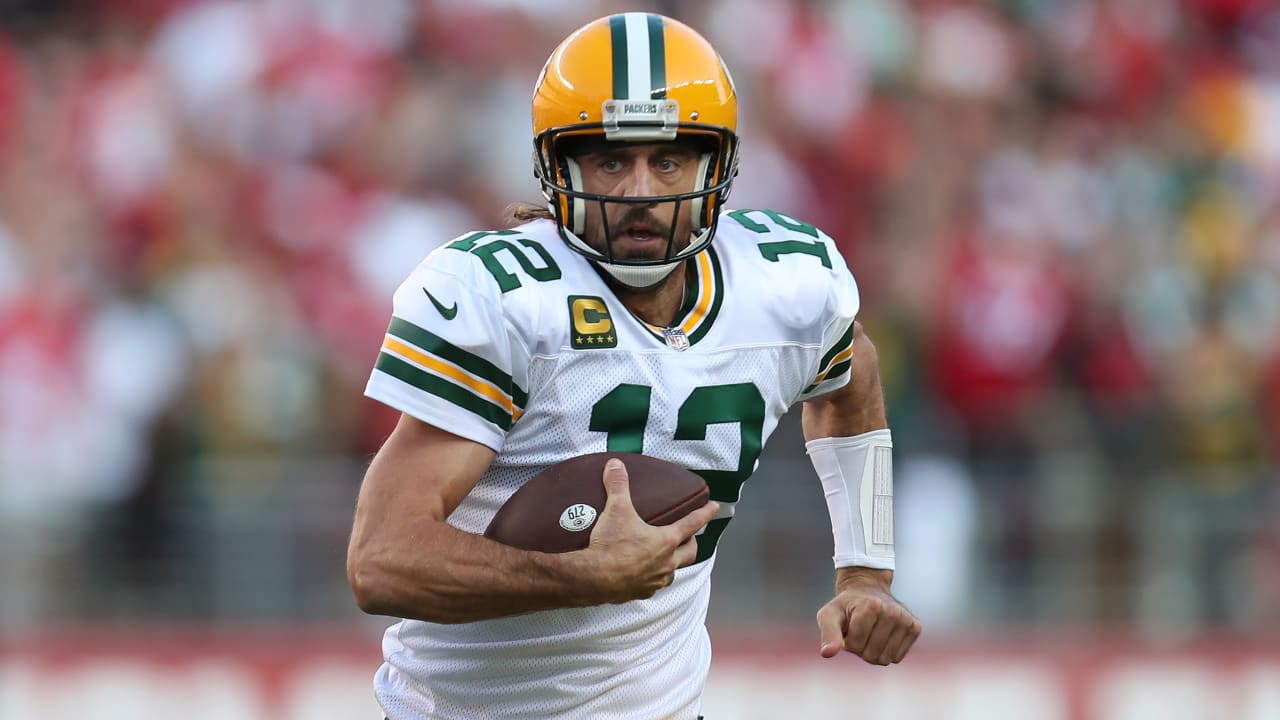 Green Bay Packers quarterback Aaron Rodgers catches his own pass after