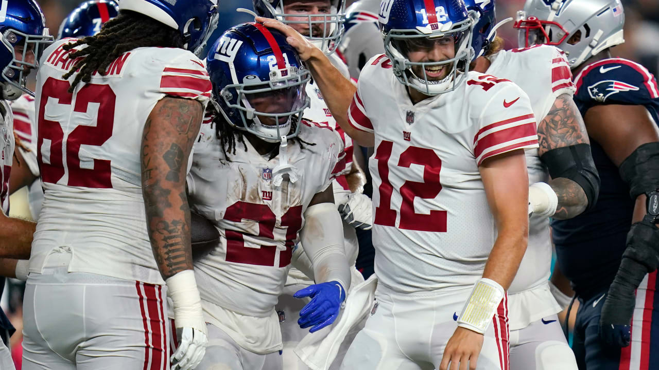 New York Giants running back Antonio Williams punches into the end zone