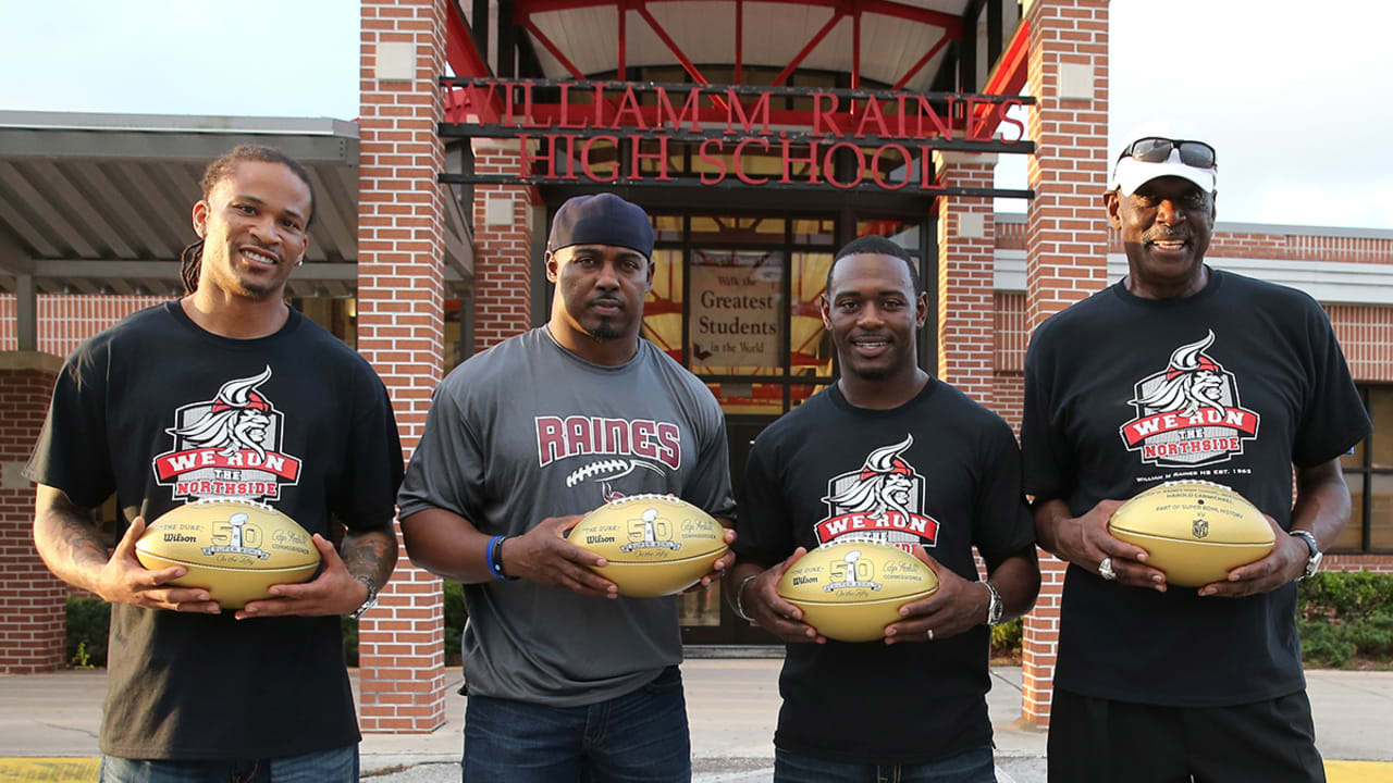Four former NFL players return to William M. Raines High School