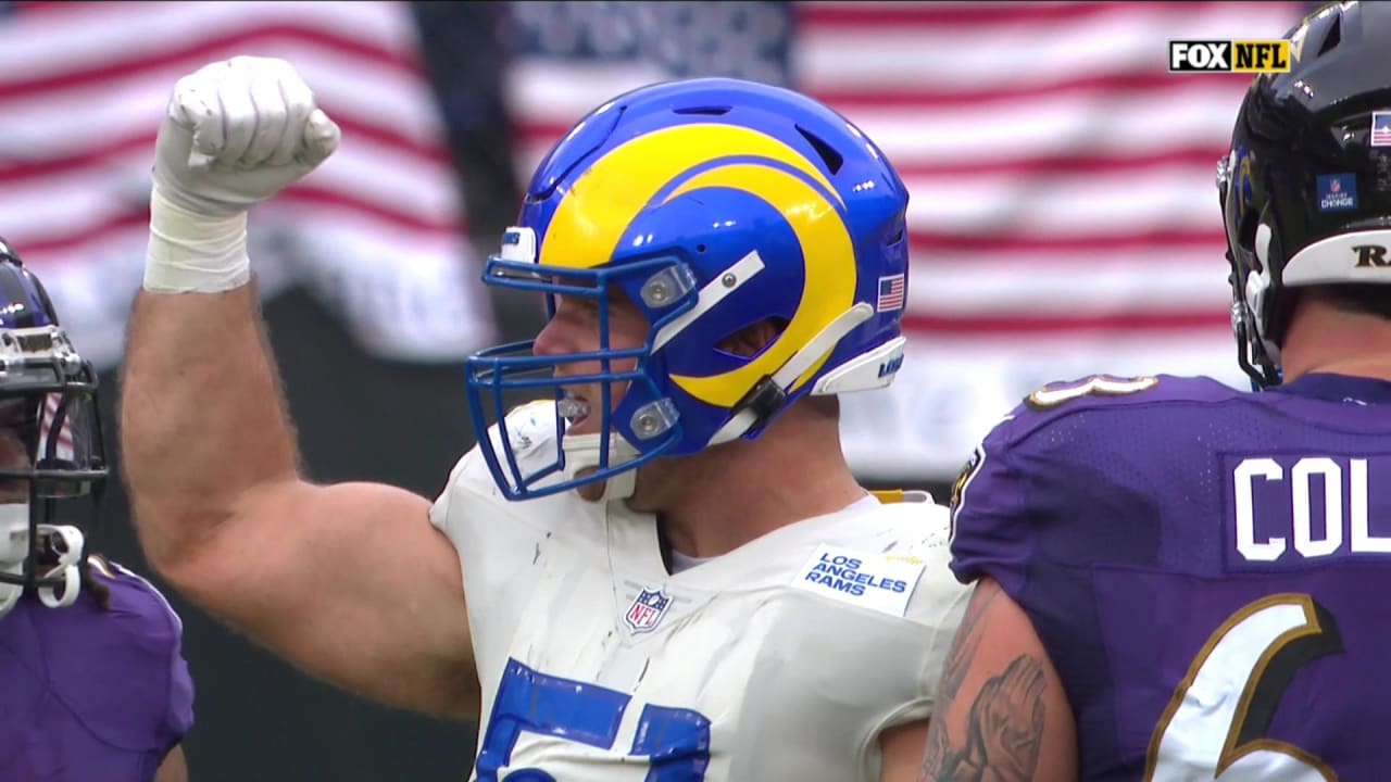 Los Angeles Rams linebacker Troy Reeder brings down Baltimore