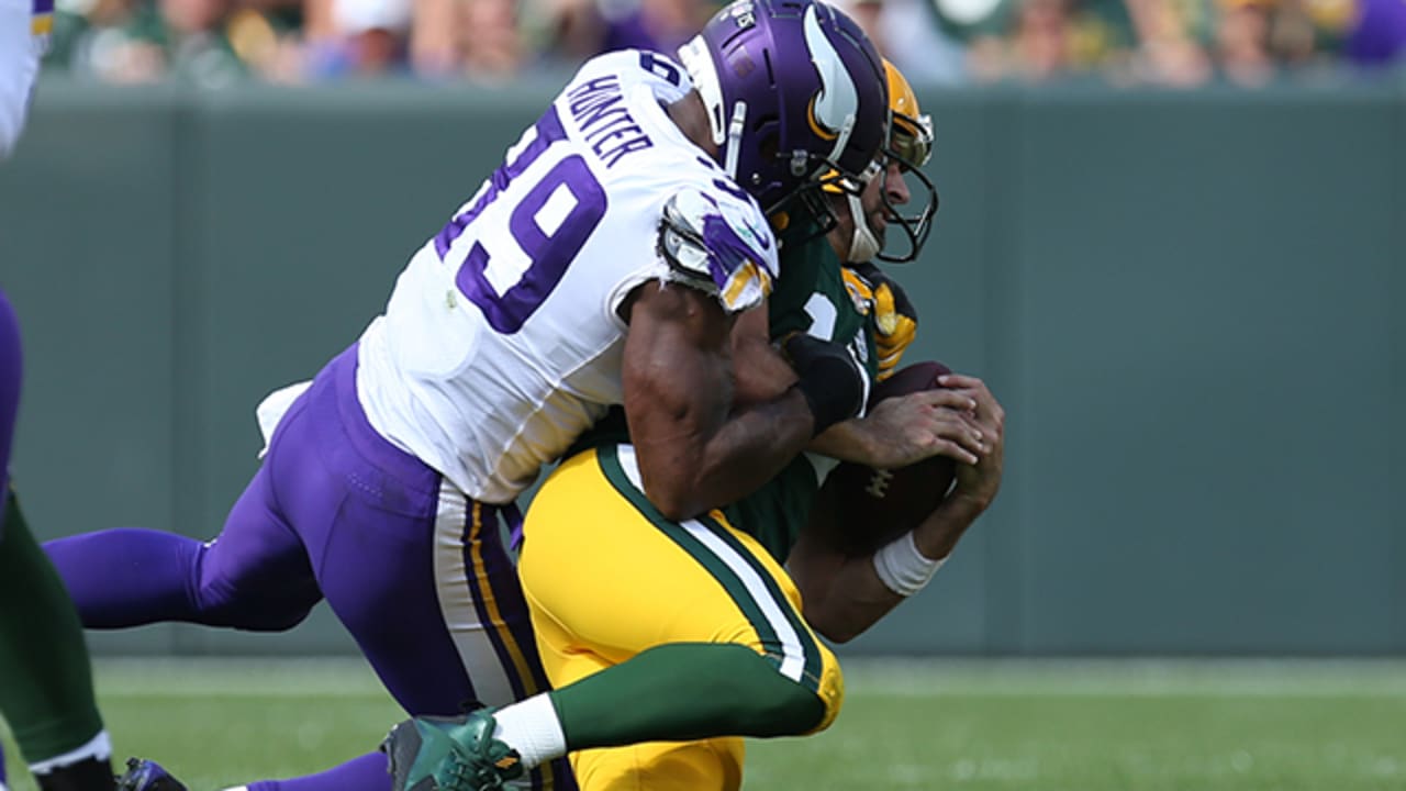 Minnesota Vikings' Danielle Hunter sacks Green Bay Packers' Aaron Rodgers  during the second hal …