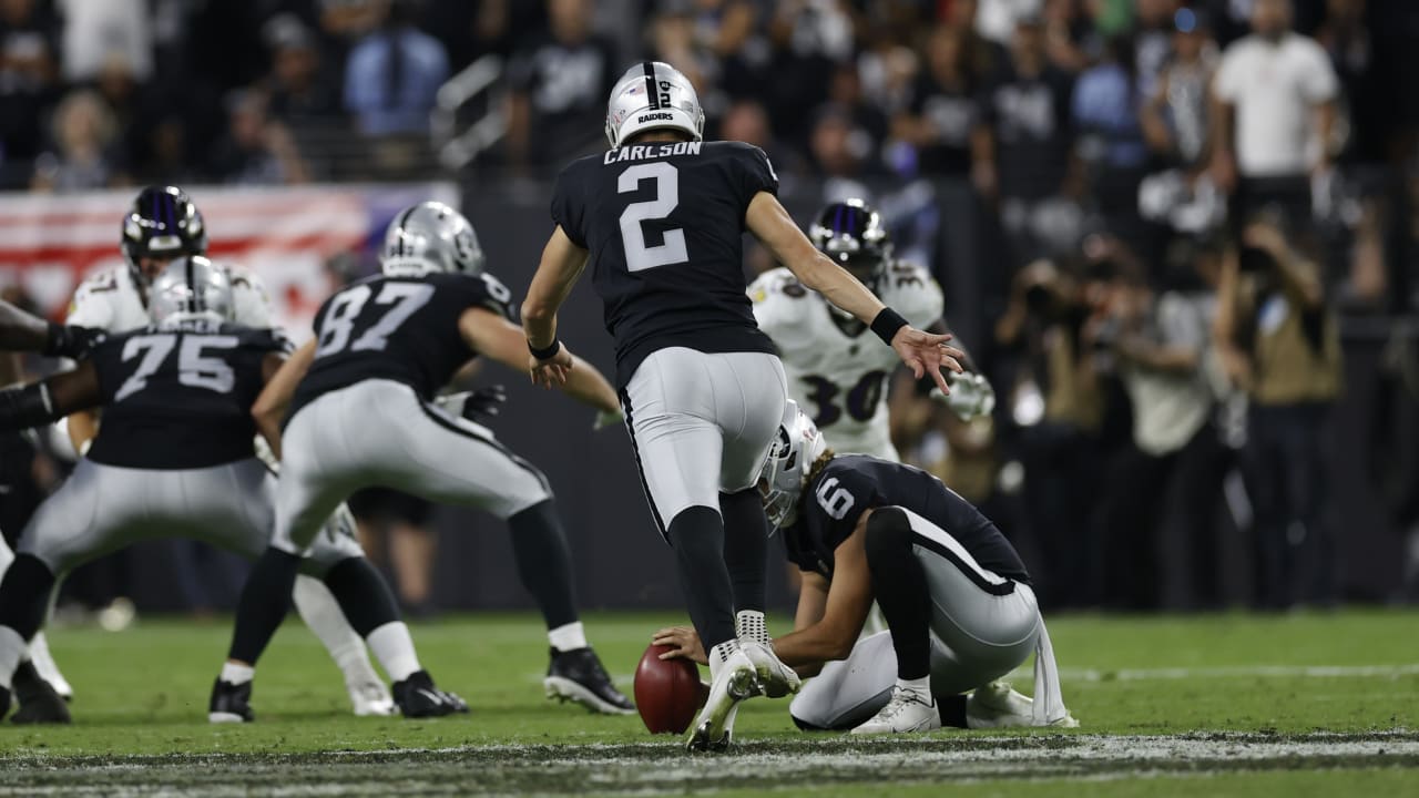 Las Vegas Raiders place kicker Daniel Carlson (2) after kicking field goal  during an NFL football game against the Seattle Seahawks, Sunday, Nov. 27,  2022, in Seattle, WA. The Raiders defeated the