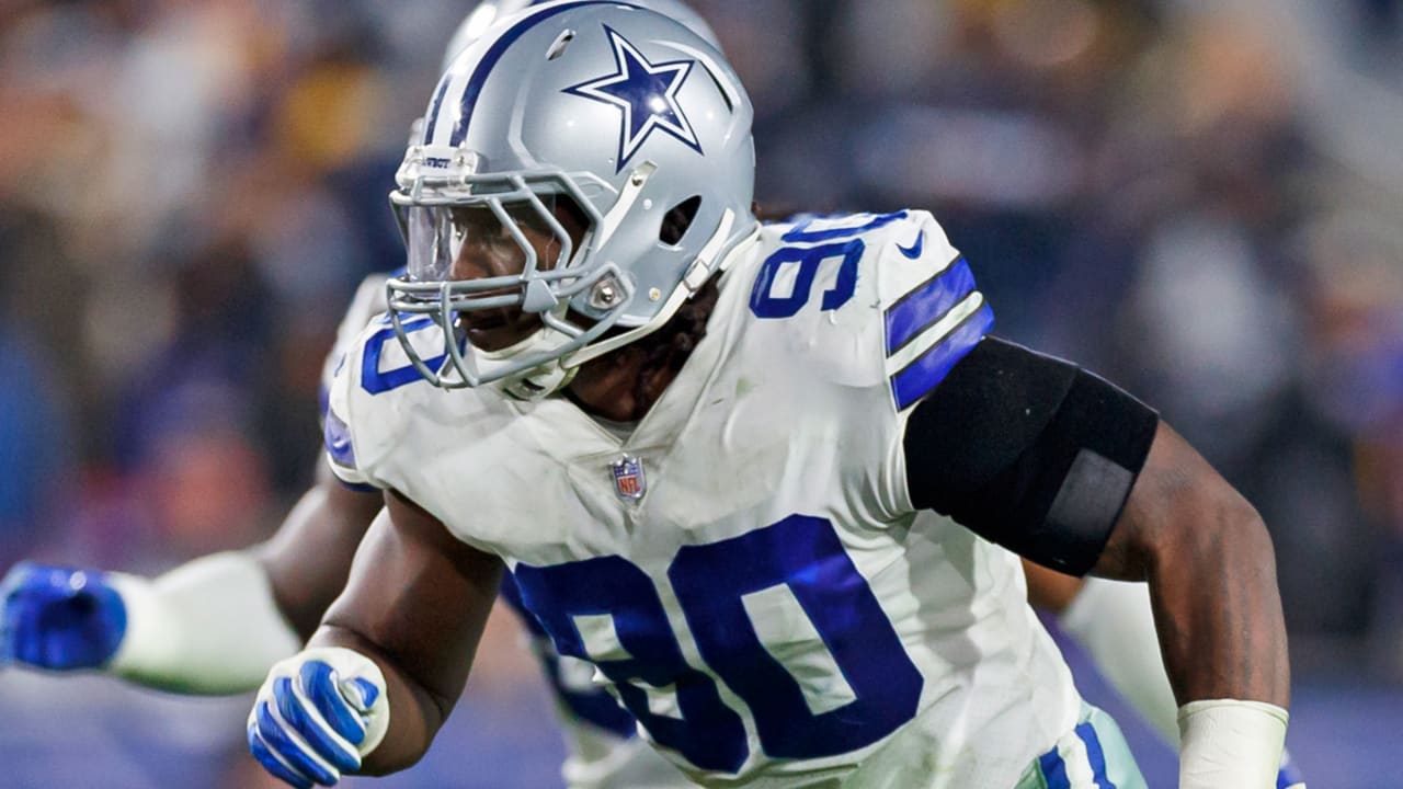 Cowboys' DeMarcus Lawrence debating whether to report to training