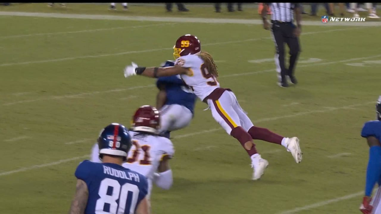 Washington Football Team defensive end Montez Sweat and Chase Young clean up New York Giants