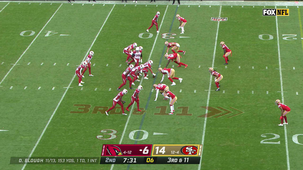 Arizona Cardinals tight end Trey McBride lunges for a first-down conversion