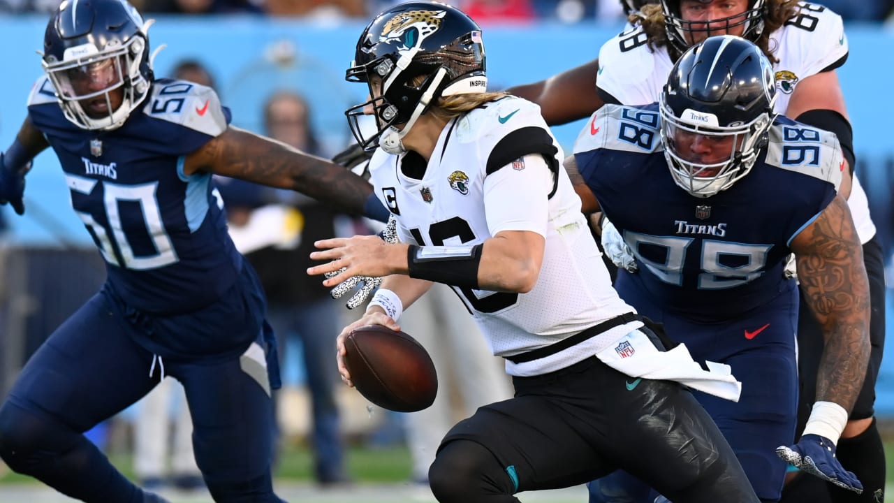 Jaguars clinch division title after Titans crumble, defense bails out  Lawrence