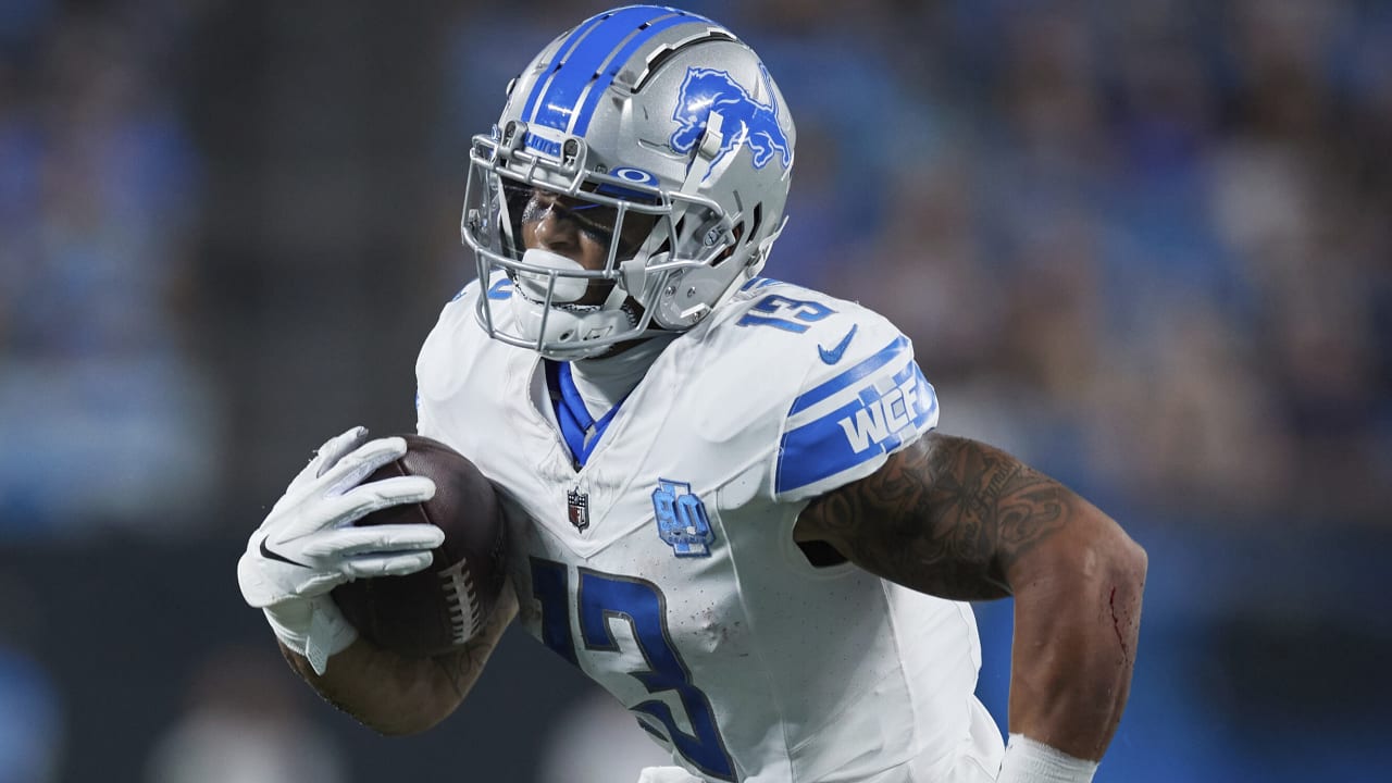 Detroit Lions running back Craig Reynolds (13) looks on against