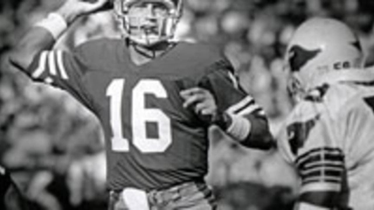 Quarterback Joe Montana #16 of the San Francisco 49ers warms up