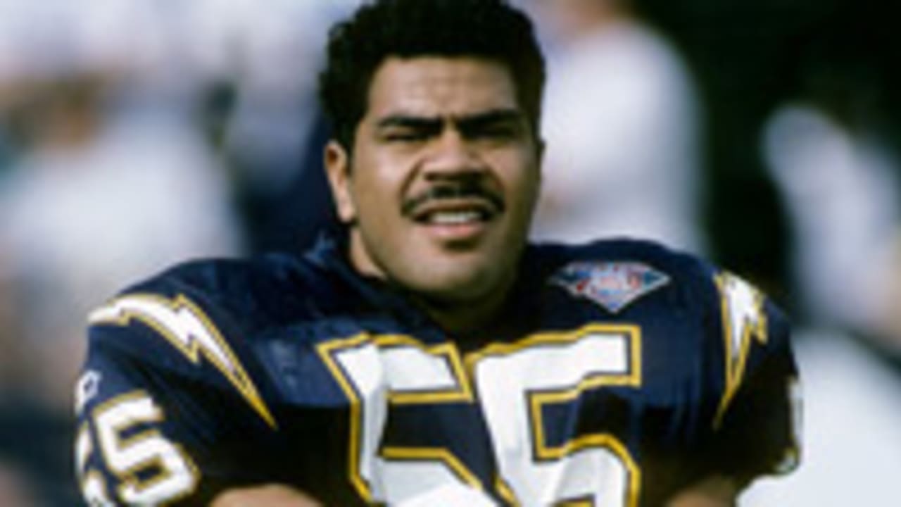 New England Patriots Junior Seau smiles while holding up the Lamar Hunt  trophy after the AFC Championship game against the San Diego Chargers at  Gillette Stadium in Foxboro Massachusetts on January 20