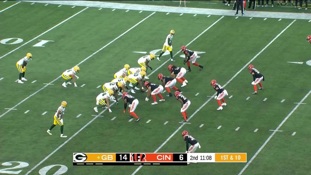 Green Bay Packers rookie wide receiver Malik Heath dodges a Bengal