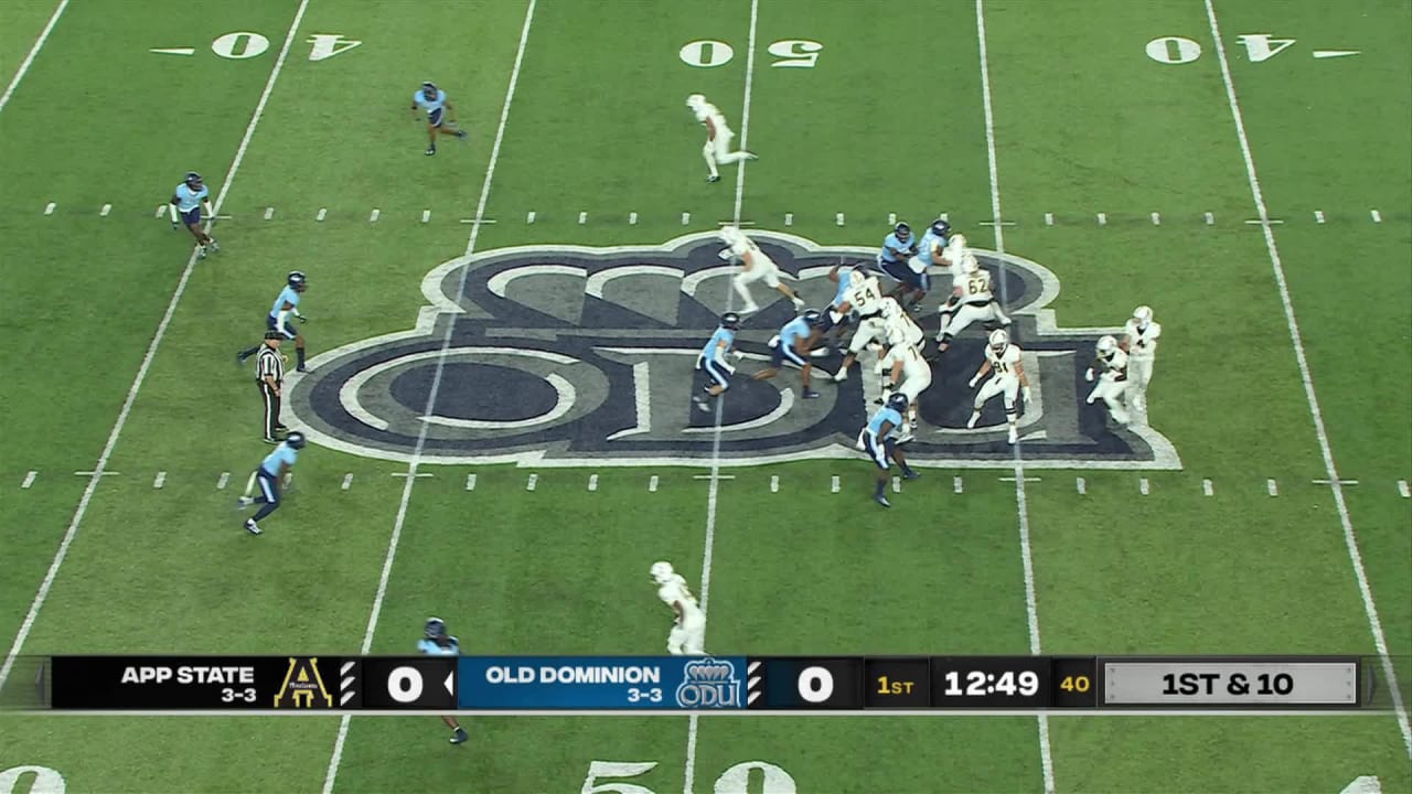 Appalachian State Mountaineers quarterback Joey Aguilar evades multiple