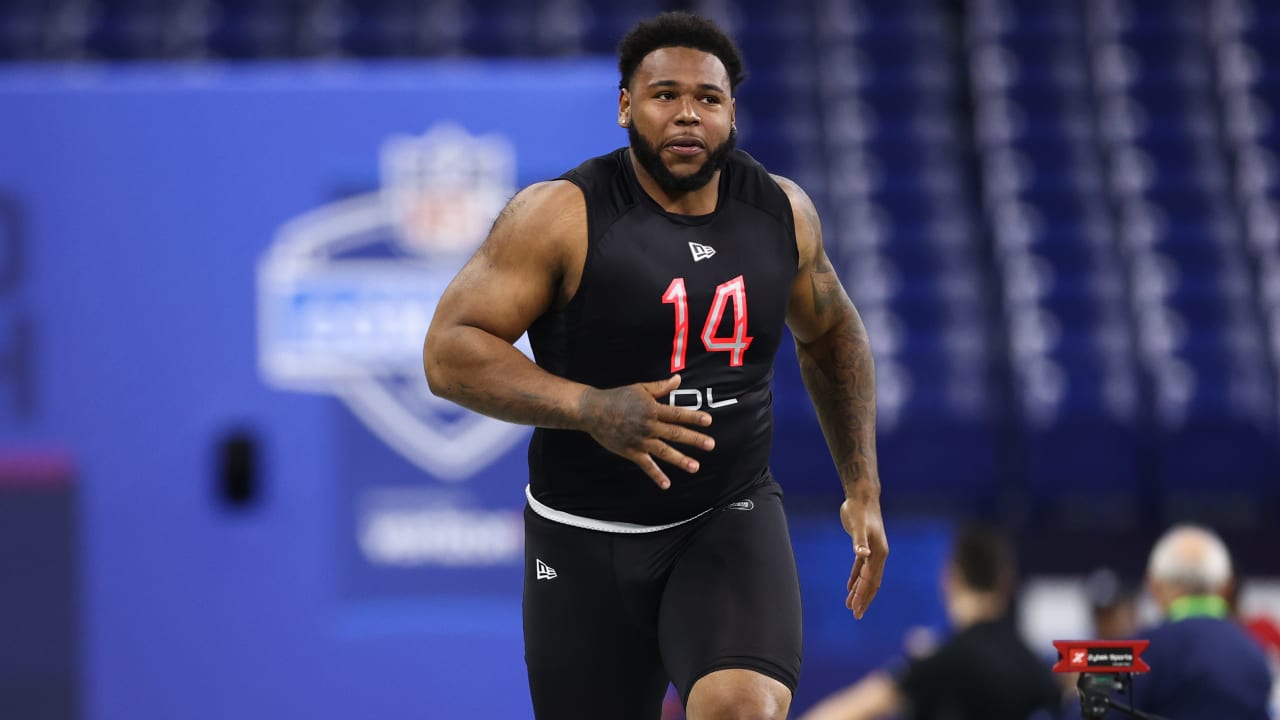 Defensive lineman Travis Jones runs an official 4.92-second time in the  40-yard dash at the 2022 combine