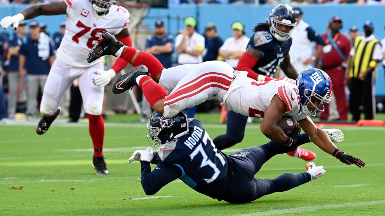 New York Giants running back Saquon Barkley frontflips over goal line