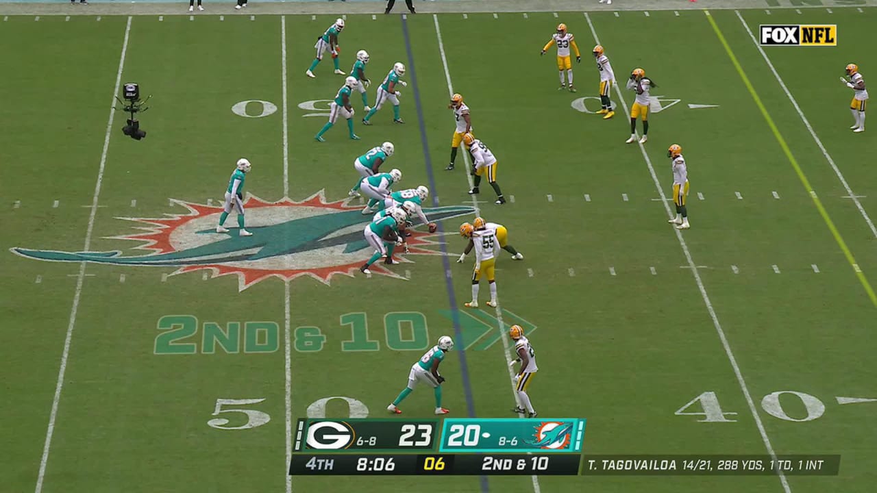 Miami Dolphins quarterback Tua Tagovailoa dots wide receiver Tyreek