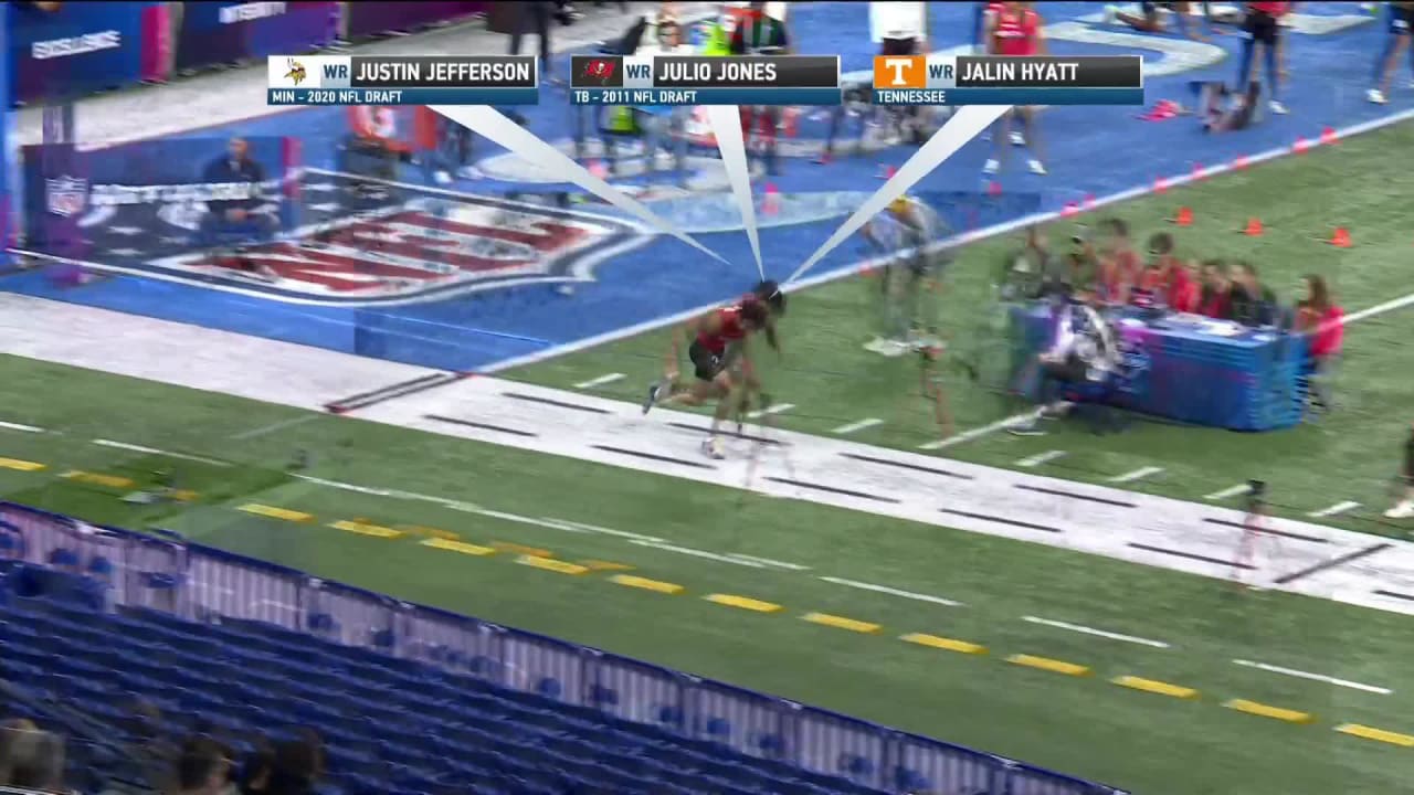 Wide receiver Jalin Hyatt runs past Julio Jones, Justin Jefferson