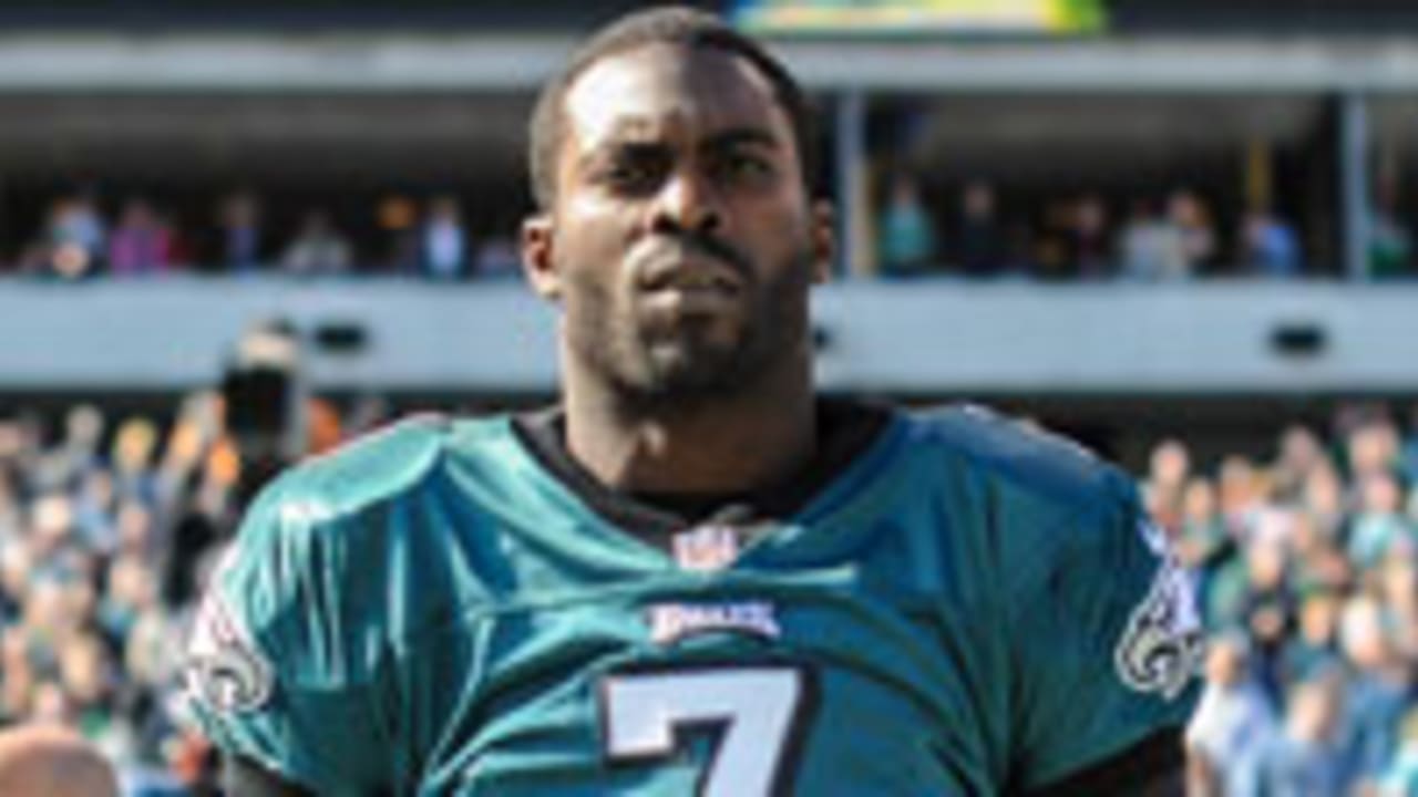 Philadelphia Eagles Michael Vick stands on the sidelines in the