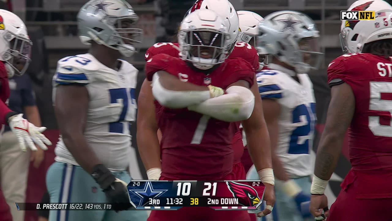 Arizona Cardinals linebacker Kyzir White ambushes running back