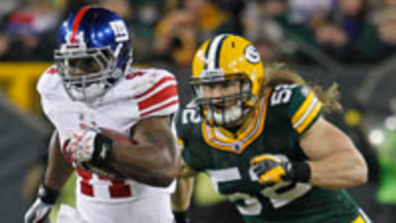 Green Bay Packers linebacker Clay Matthews reacts as he leaves the field  after the Packers defeated the New York Giants, 38-35, in an NFL football  game Sunday, Dec. 4, 2011 in East