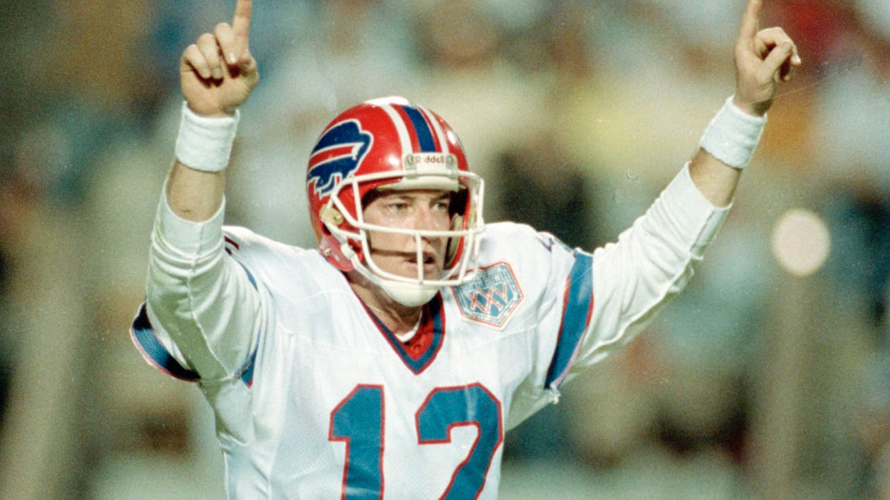 Buffalo Bills Bruce Smith, (78), gets a hand on a pass by Houston Oilers  quarterback Warren Moon during the second quarter of the AFC playoff game  in Buffalo, Jan.1, 1989. The Bills