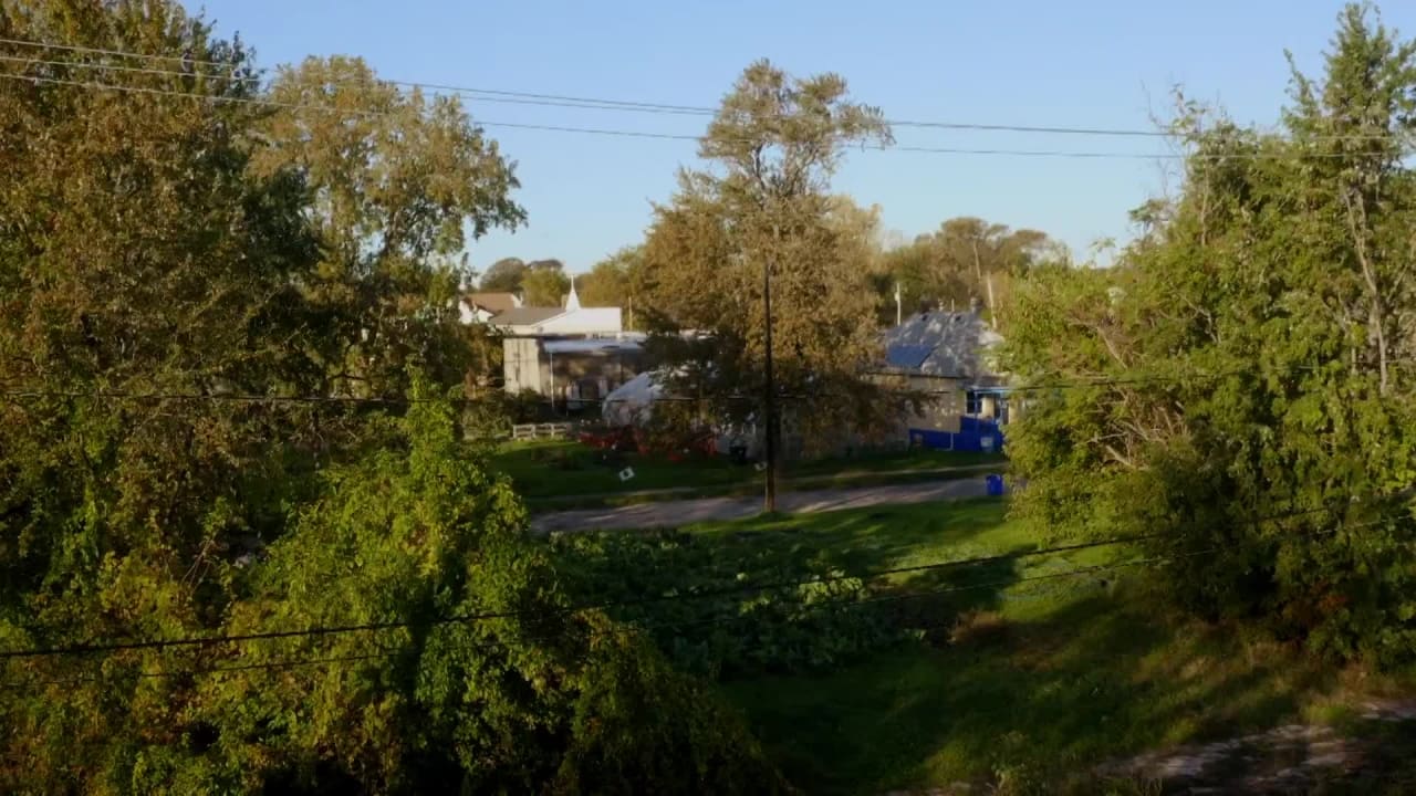 Detroit Lions players surprise Detroit farmer with greenhouse