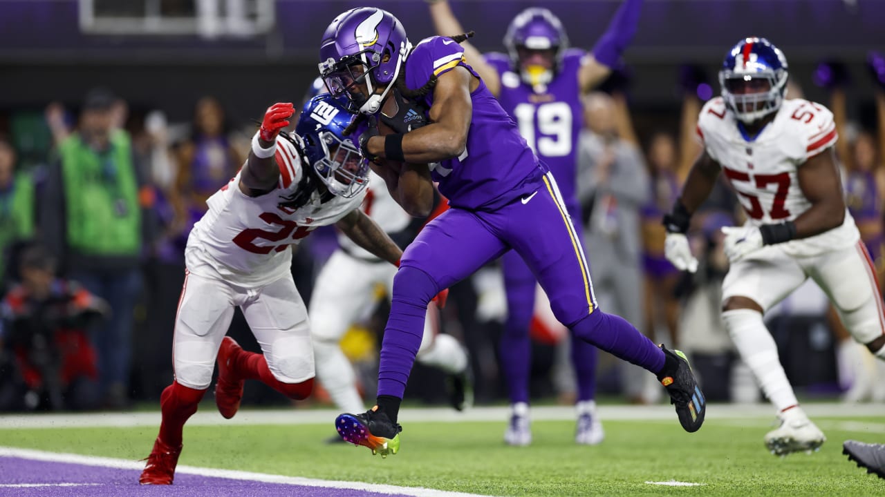 Minnesota Vikings wide receiver K.J. Osborn returns a Denver