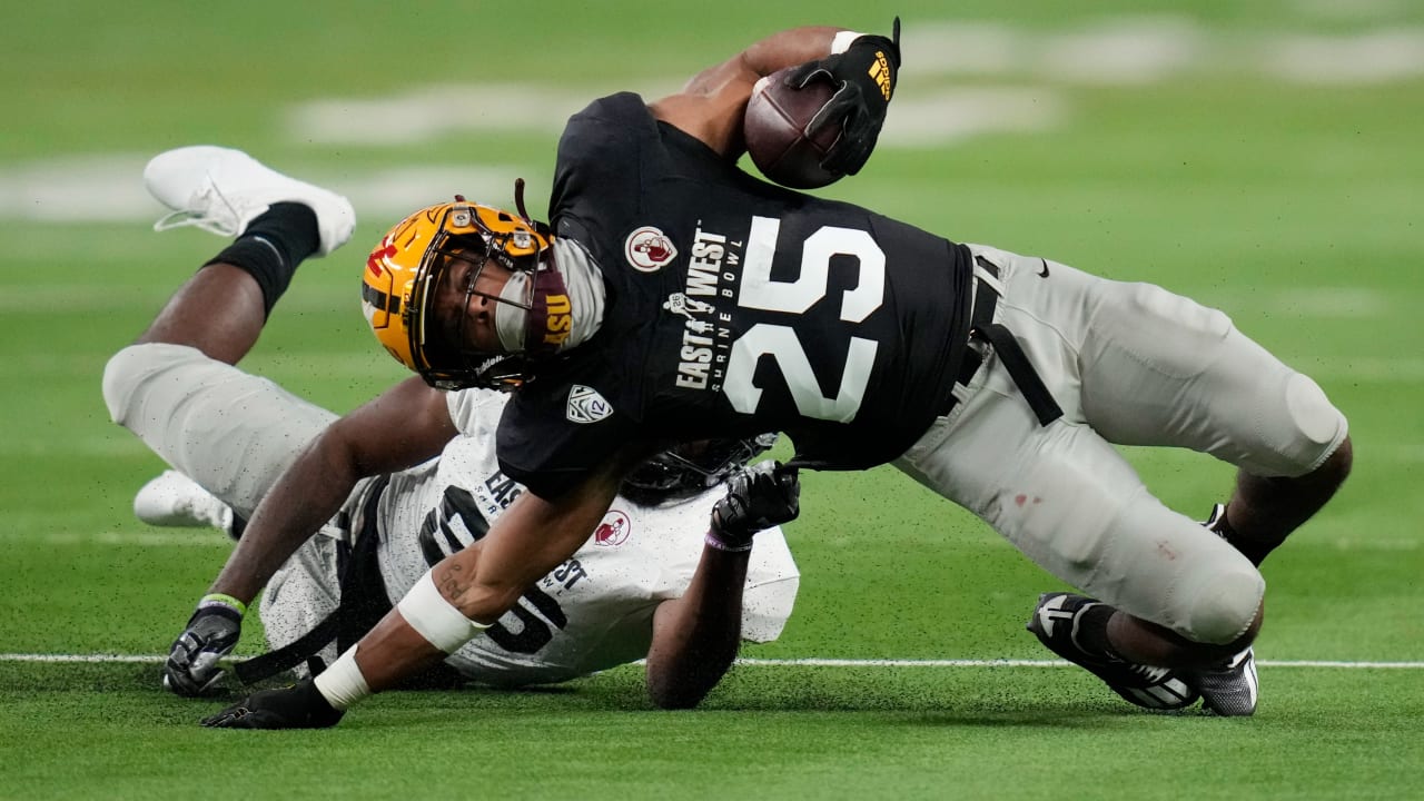 Eastern Michigan Eagles EDGE rusher Jose Ramirez jars the football loose  for a strip-sack takeaway recovered by Western Kentucky Hilltoppers  defensive lineman Brodric Martin