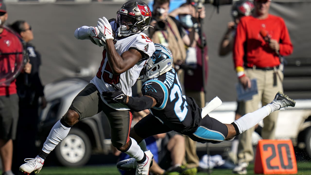 Tampa Bay Buccaneers' Cyril Grayson, left, celebrates as he leaves