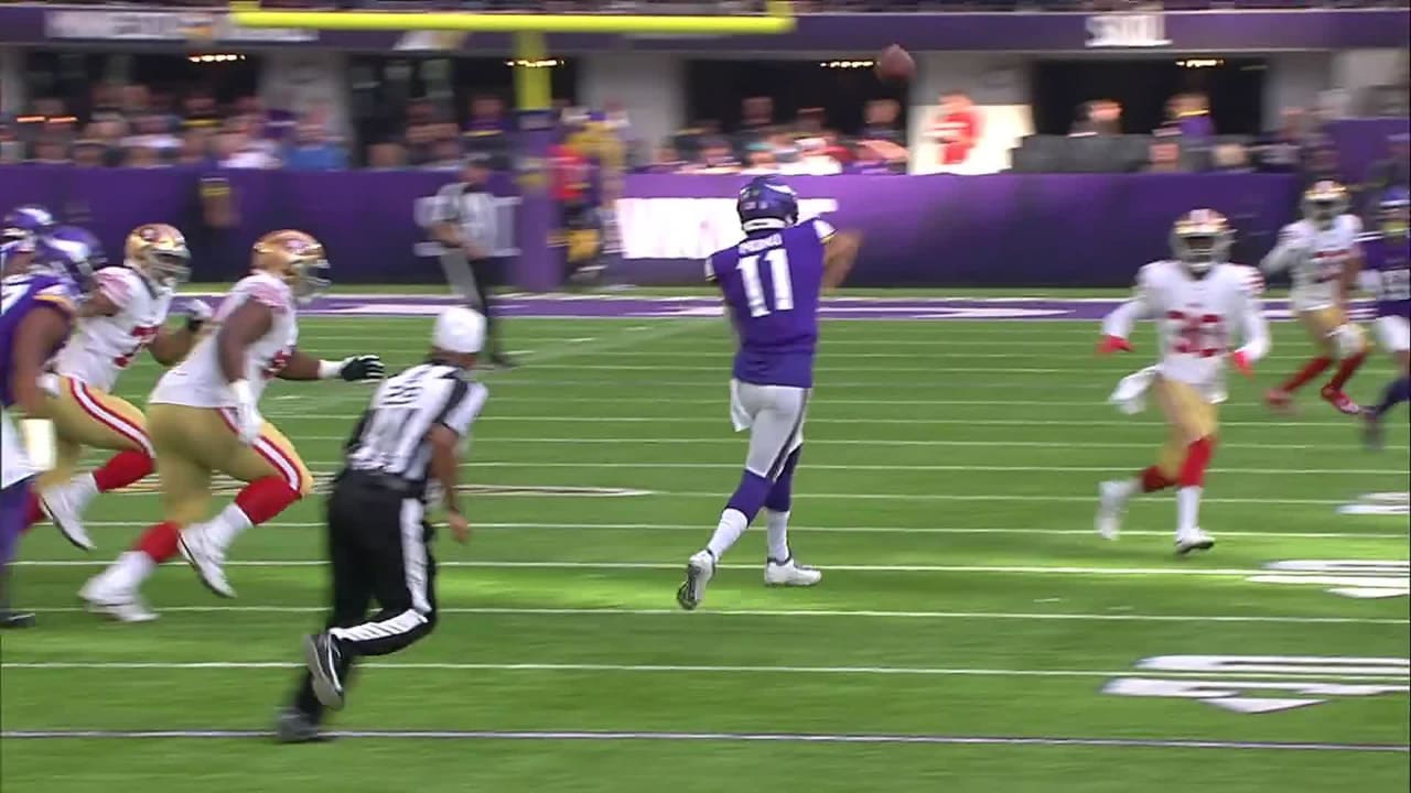 Minnesota Vikings quarterback Kellen Mond rolls and completes 16-yard