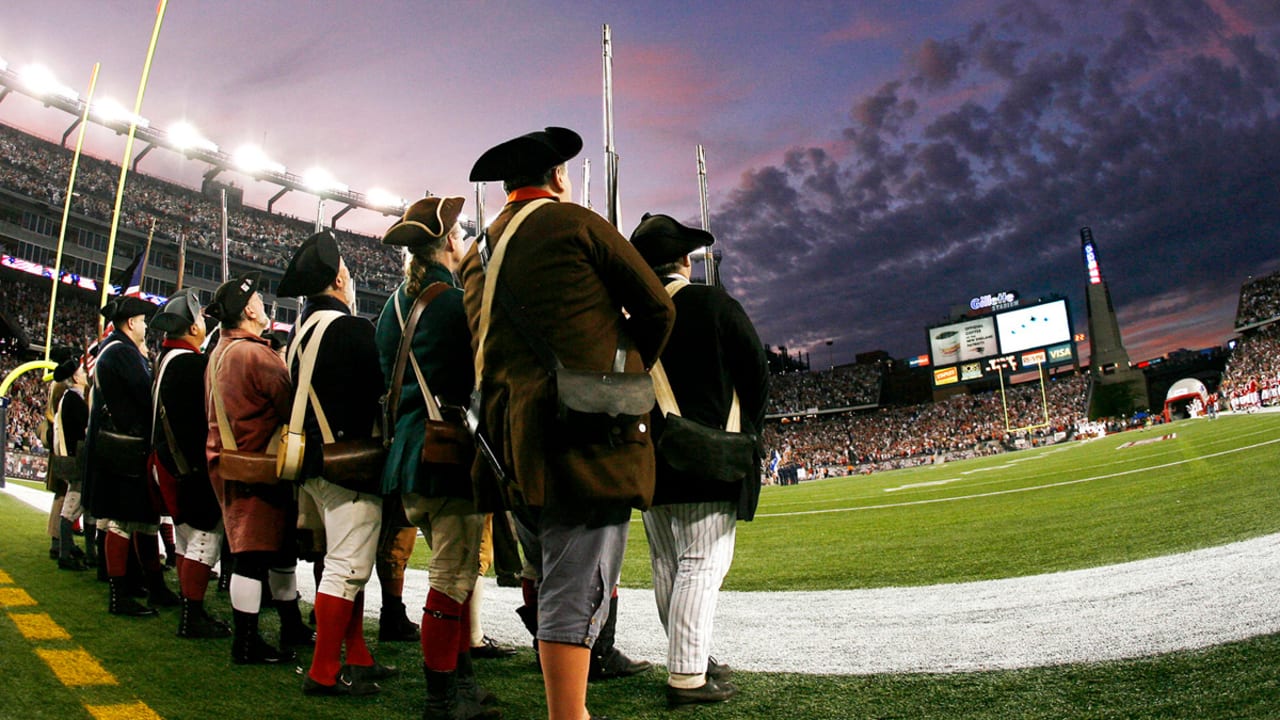 Military personnel carry the colors before the start of an NFL football  game between the Cincinnati Bengals and the Carolina Panthers during the  NFL Salute to Service, Sunday, Nov. 6, 2022, in