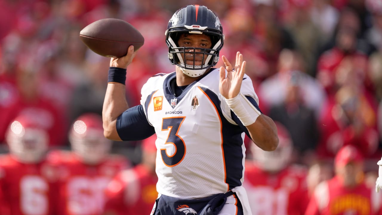 Denver Broncos quarterback Russell Wilson follows slew of blockers on a ...