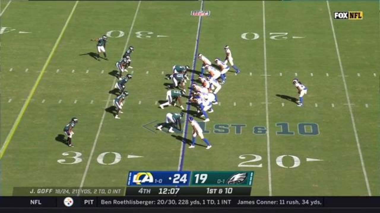 Los Angeles Rams running back Darrell Henderson hits the gas on an ...