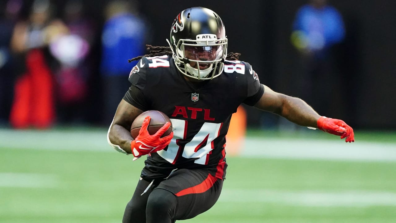 Cordarrelle Patterson of the Atlanta Falcons holds a sign from a