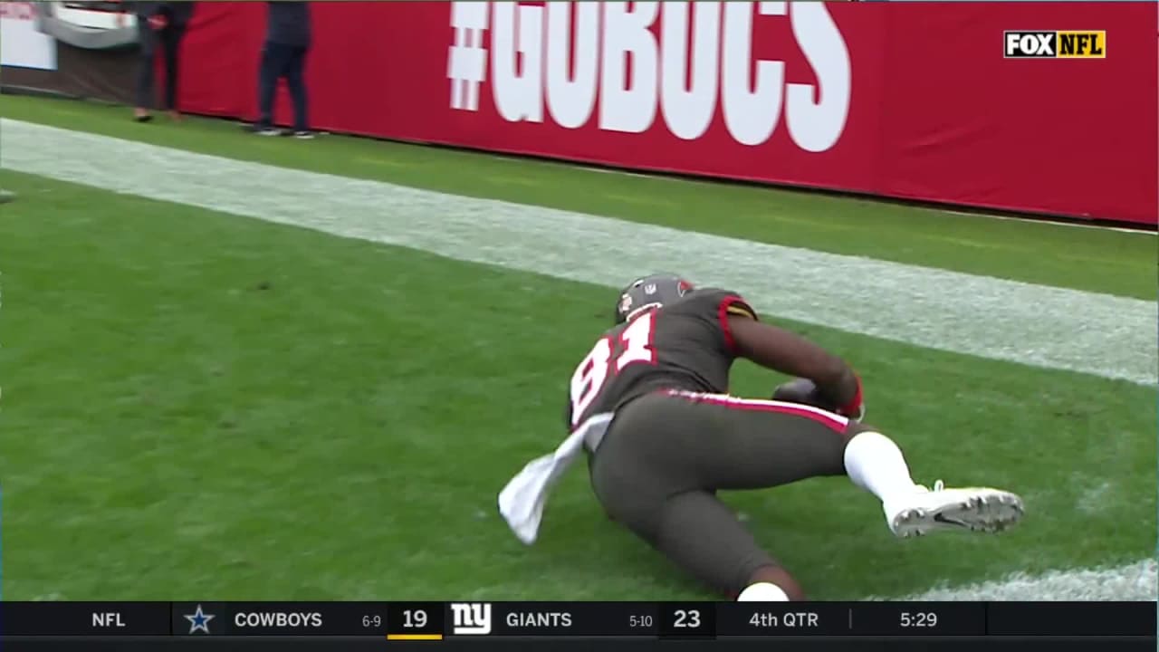Tampa Bay Buccaneers wide receiver Antonio Brown front-flips into the end zone for his second