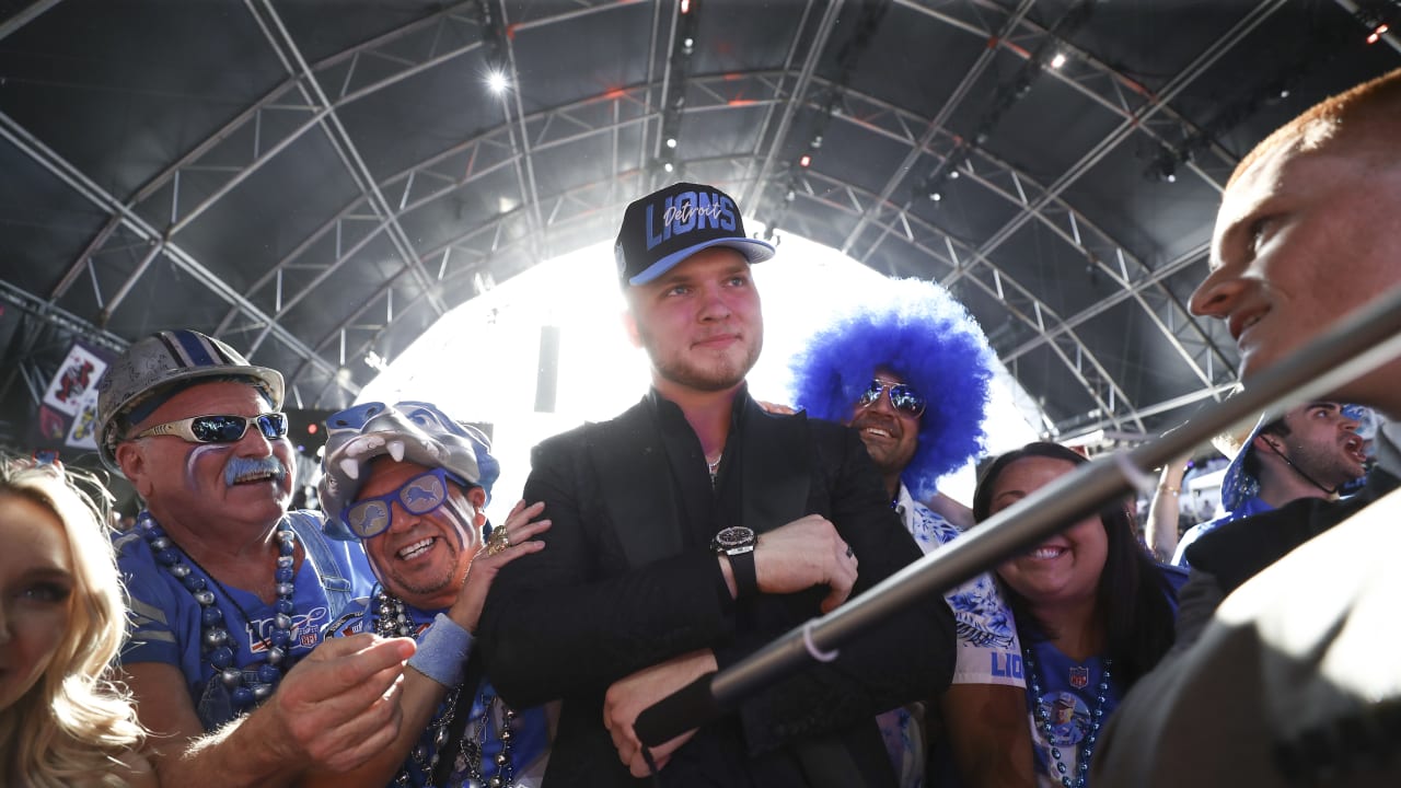 Utah Utes Devin Lloyd bear hugs Roger Goodell at NFL Draft