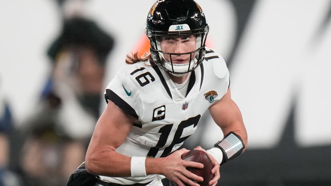 Jacksonville Jaguars quarterback Trevor Lawrence (16) passes the ball  during the first half of an NFL