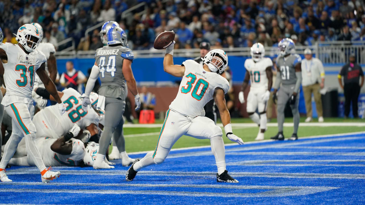 Miami Dolphins fullback Alec Ingold (30) runs for a touchdown during the  first half of an NFL football game against the Cleveland Browns, Sunday,  Nov. 13, 2022, in Miami Gardens, Fla. (AP