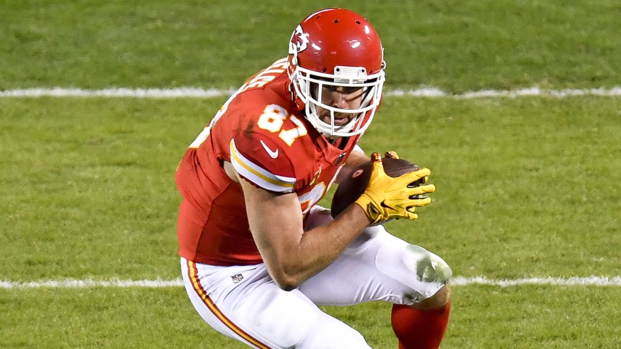 Kansas City Chiefs tight end Travis Kelce passes tight end Rob